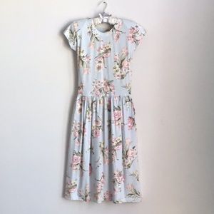 100% cotton dress with two pockets. Made Hong Kong